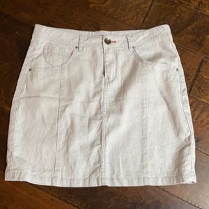 Worn jeans khaki skirt